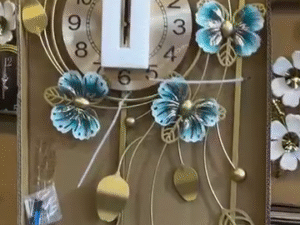 Peacock Flowers Designer Wall Clock – 47 x 21 Inches | Artistic Home Décor with Elegant Metallic Finish