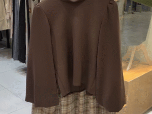 🤎 Classic Meets Chic: Brown Long-Sleeved Turtleneck with Plaid Skirt