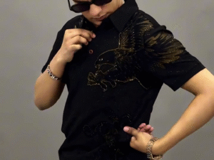 🦅✨ Bold Prestige: Black Polo T-Shirt with Striking Gold Eagle Graphic